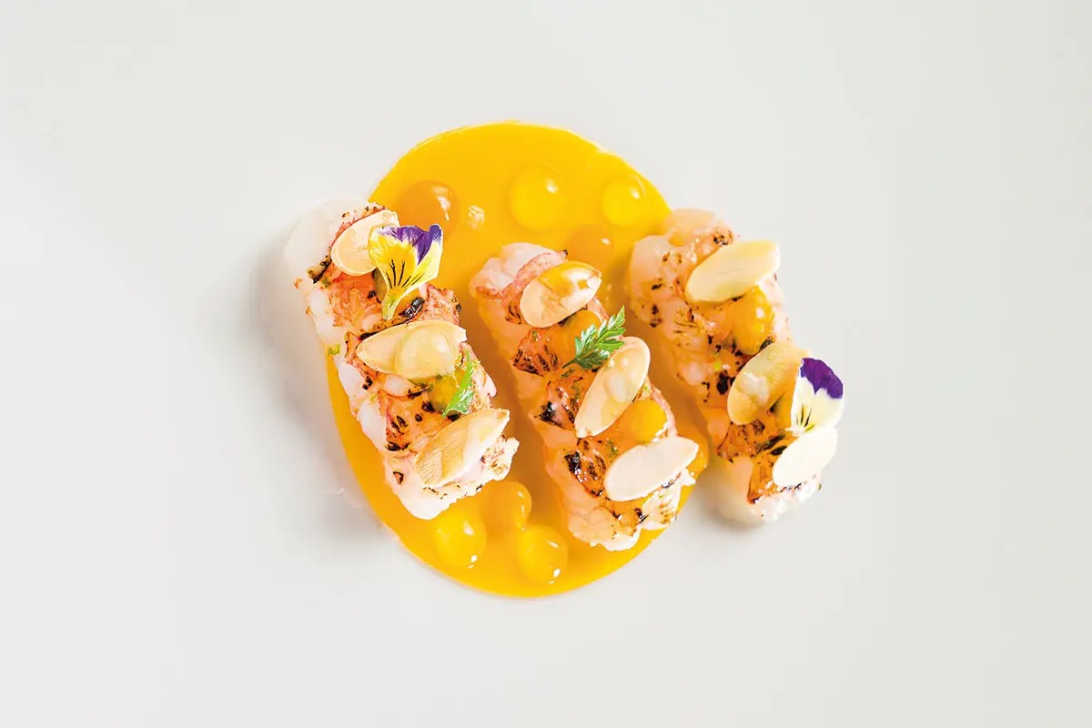  Scampo al miele, frutto della passione, granita di mandorla