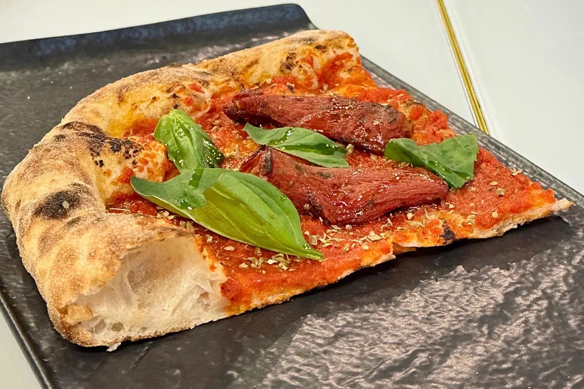  Scoprire torzella, papaccella e fagiolo dente di morto su una pizza ad Acerra